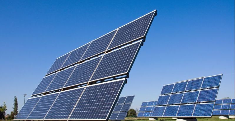 Solar energy panels on a meadow (panel)